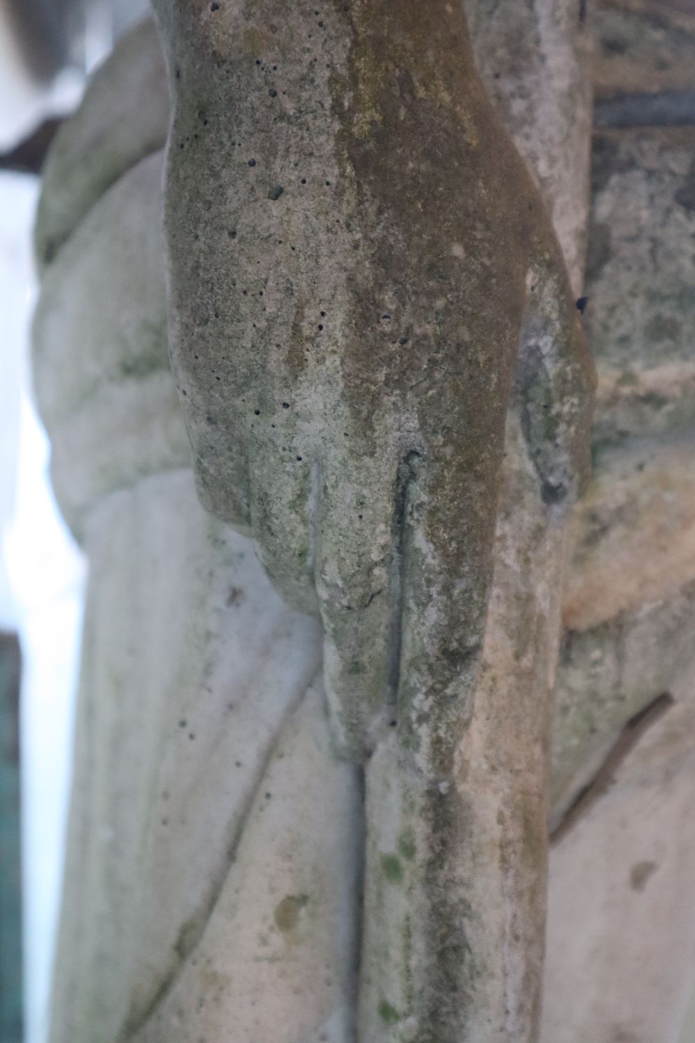 A reconstituted stone garden statue of an archer and hound, height 190cm